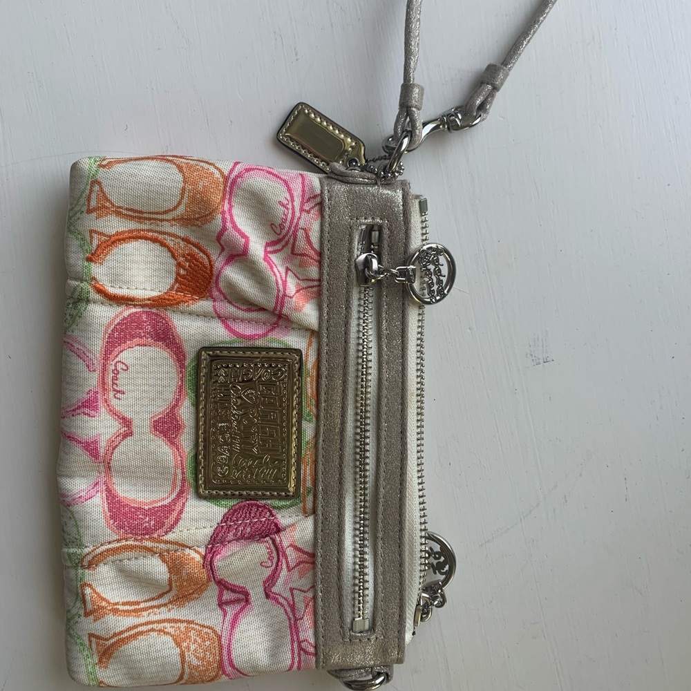 Coach multicolored logo wristlet